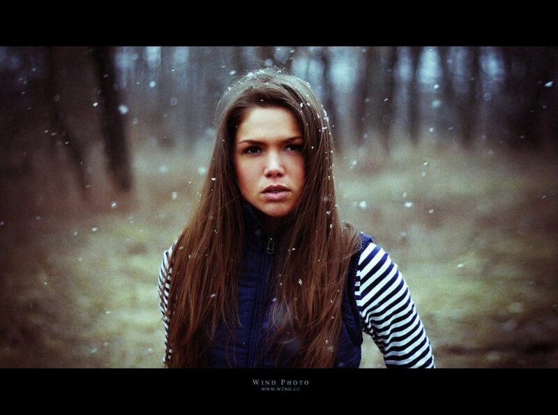 woman in snowy forest
