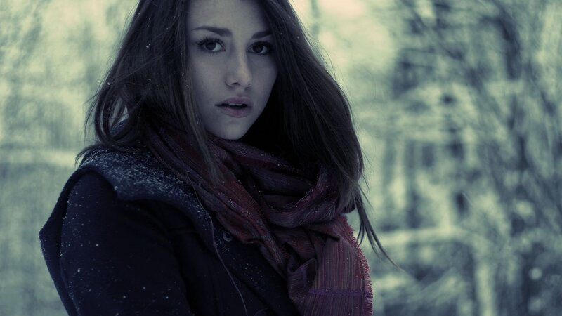 woman in snowy forest