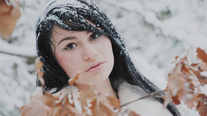 woman in snowy forest