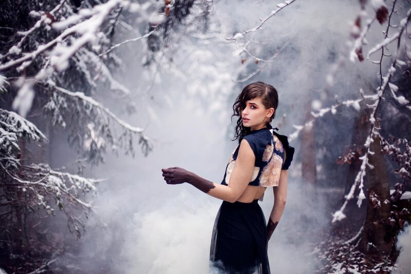 woman in snowy forest