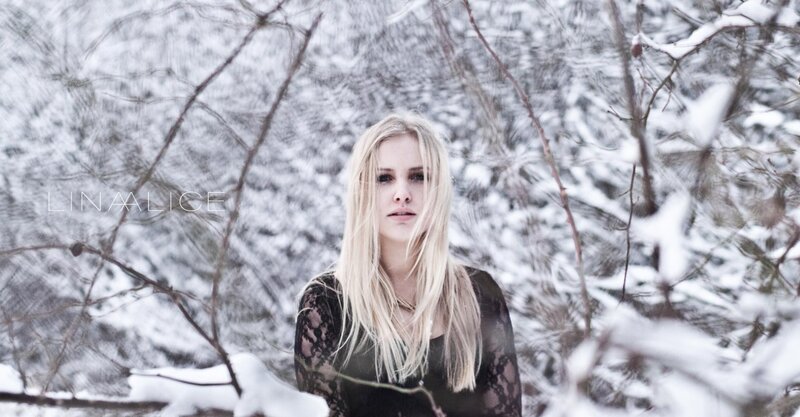 woman in snowy forest