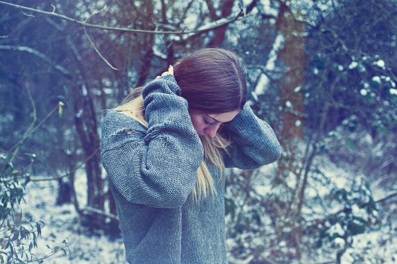 woman in snowy forest