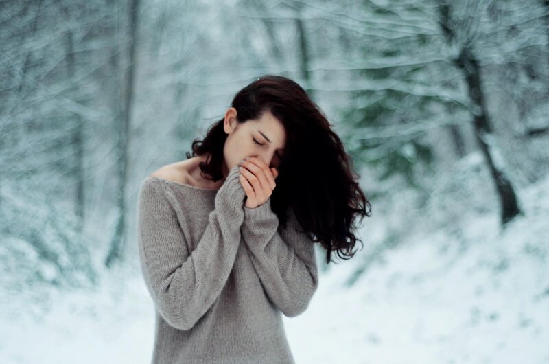 woman in snowy forest