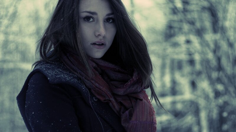 woman in snowy forest
