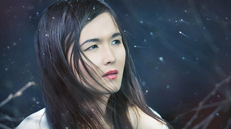 woman in snowy forest
