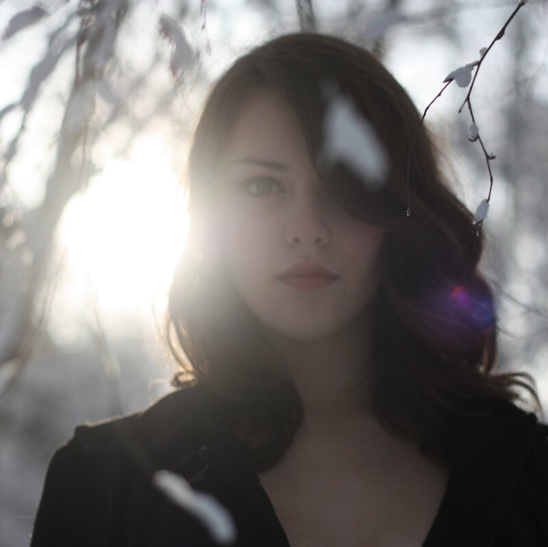 woman in snowy forest