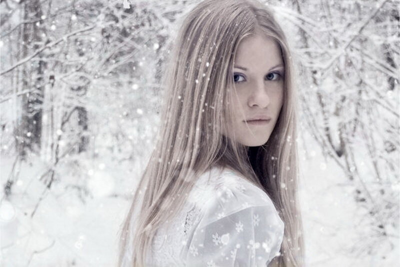 Woman in Snowy Forest — White