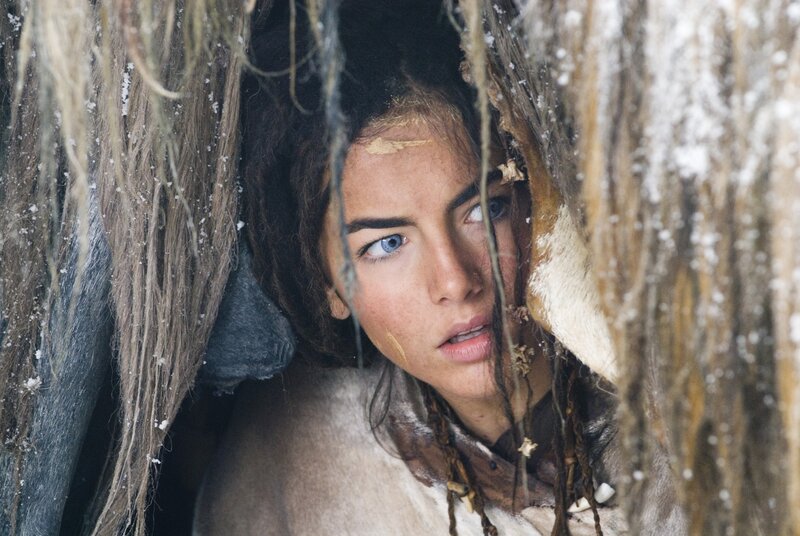 woman in snowy hideout