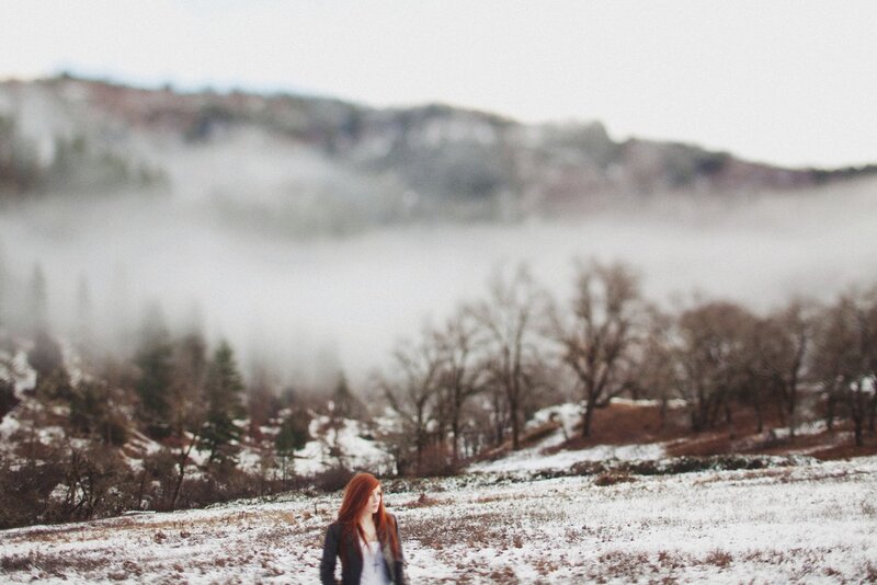 Woman in snowy landscape