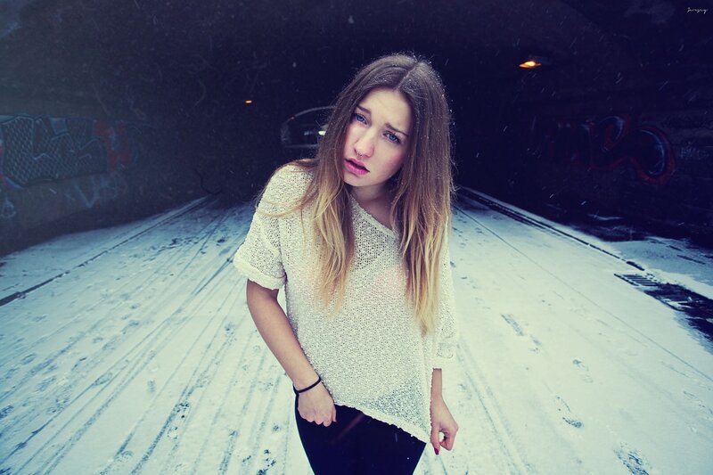 Woman in snowy tunnel