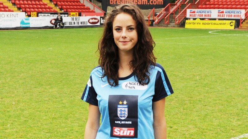 woman in soccer jersey