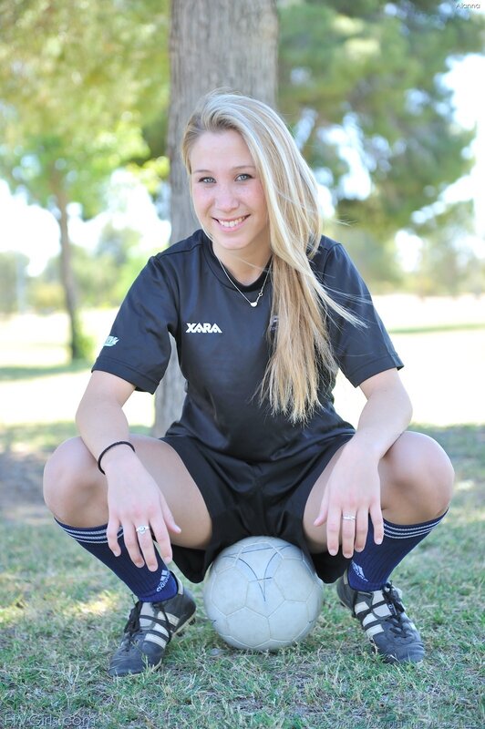 woman in soccer uniform