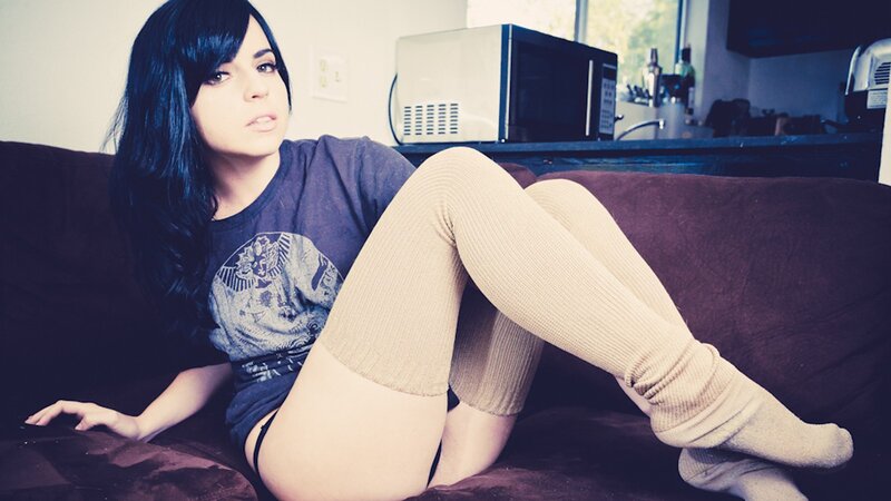 woman in socks on a couch