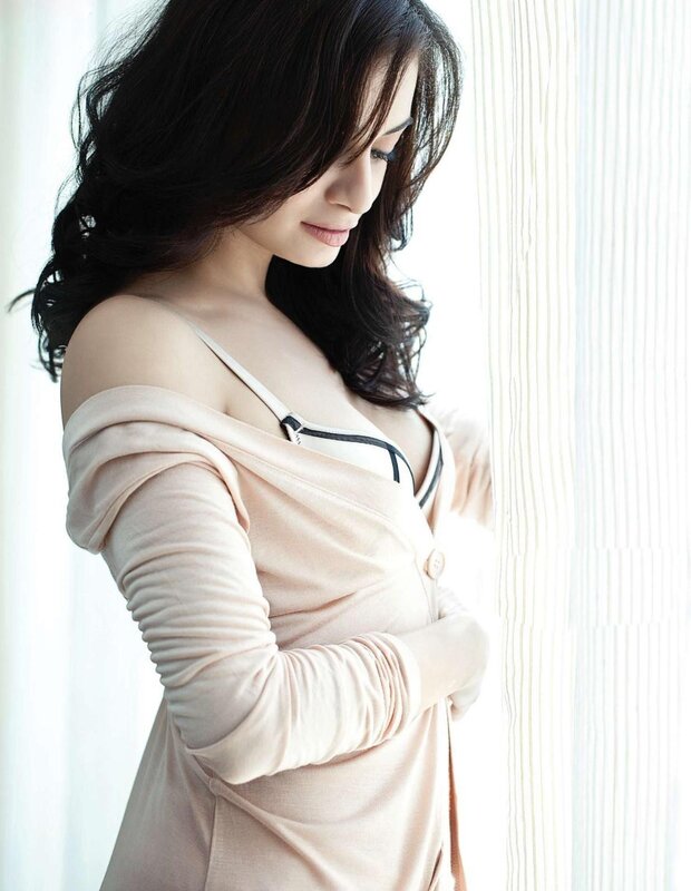 woman in soft pink cardigan