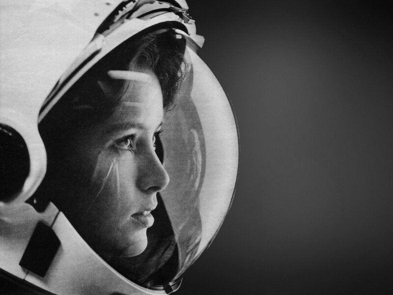woman in space helmet