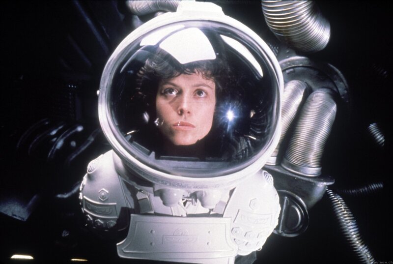 Woman in space suit helmet