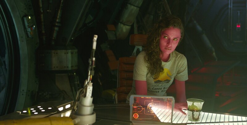 Woman in Spaceship Cockpit — Green
