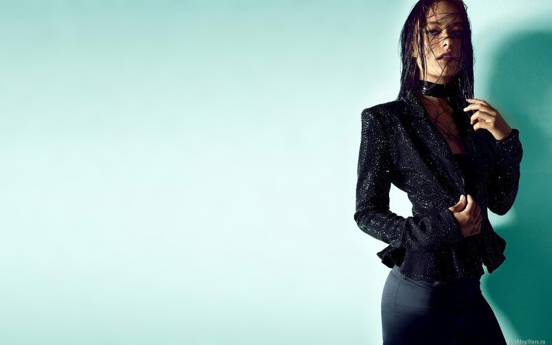 woman in sparkly black jacket