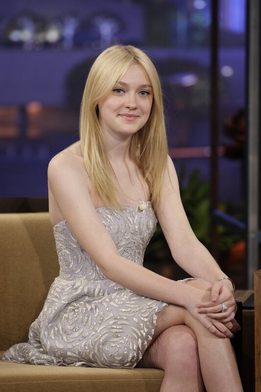 woman in sparkly dress on talk show