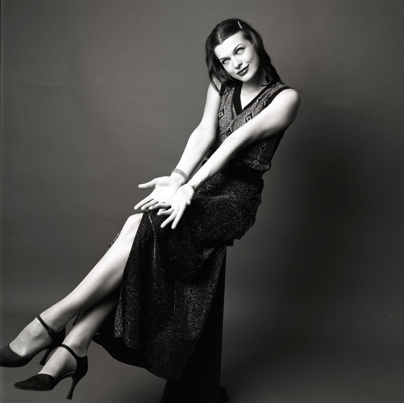 woman in sparkly dress posing