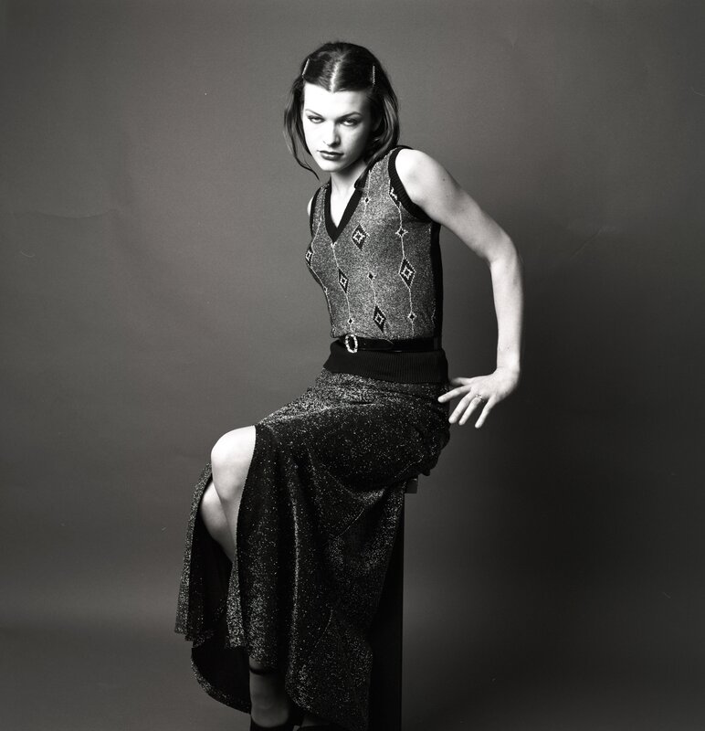 woman in sparkly dress posing