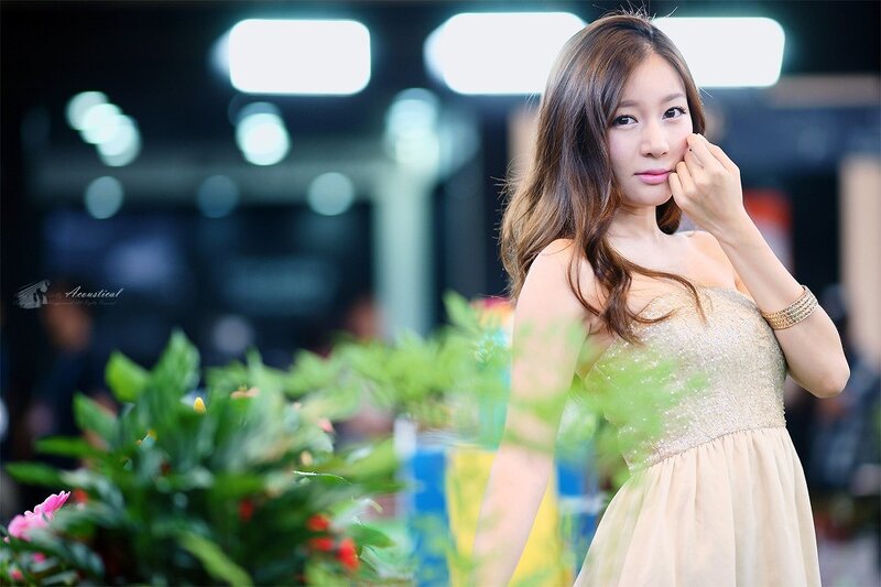 woman in sparkly dress posing