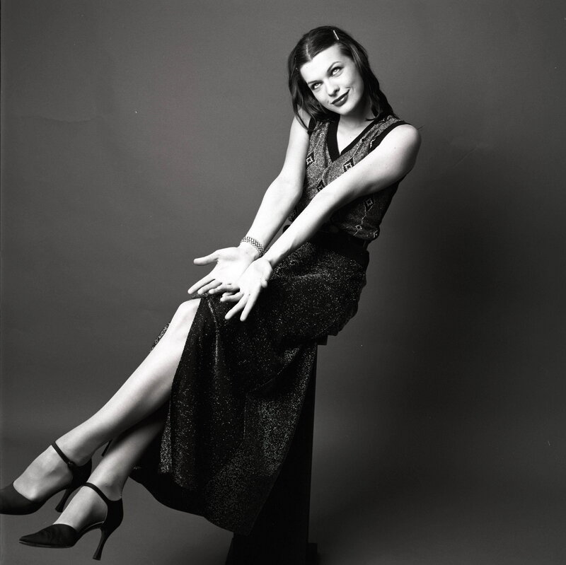 woman in sparkly dress posing