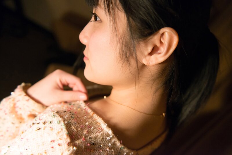 woman in sparkly sweater