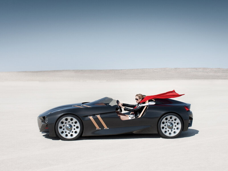 Woman in Sports Car — Black, Dramatic, Afternoon