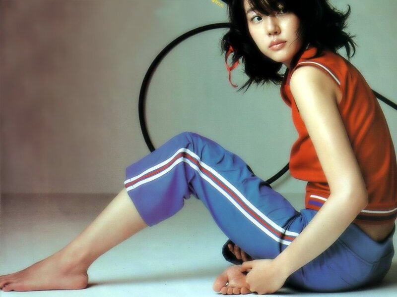 woman in sportswear sitting
