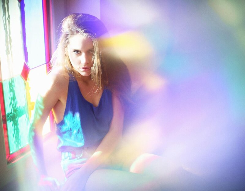woman in stained glass light