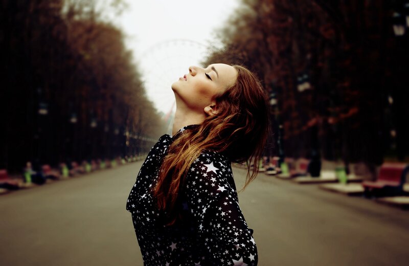 woman in star-patterned shirt