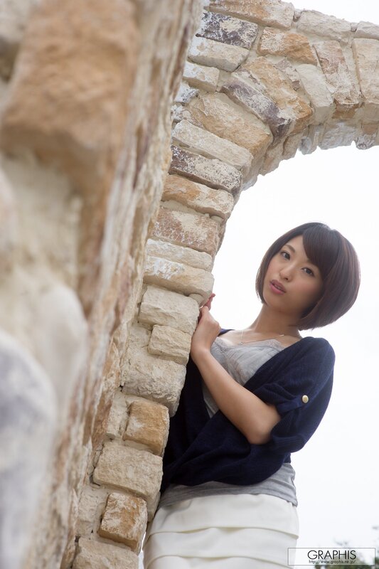 woman in stone archway