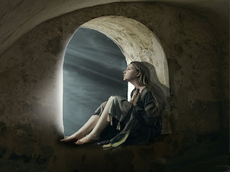 woman in stone archway