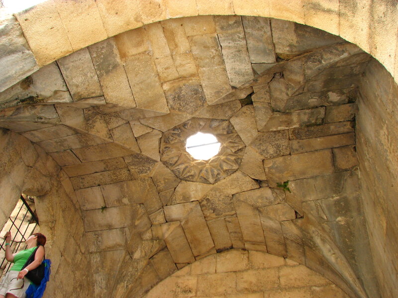 Woman in Stone Archway — Beige