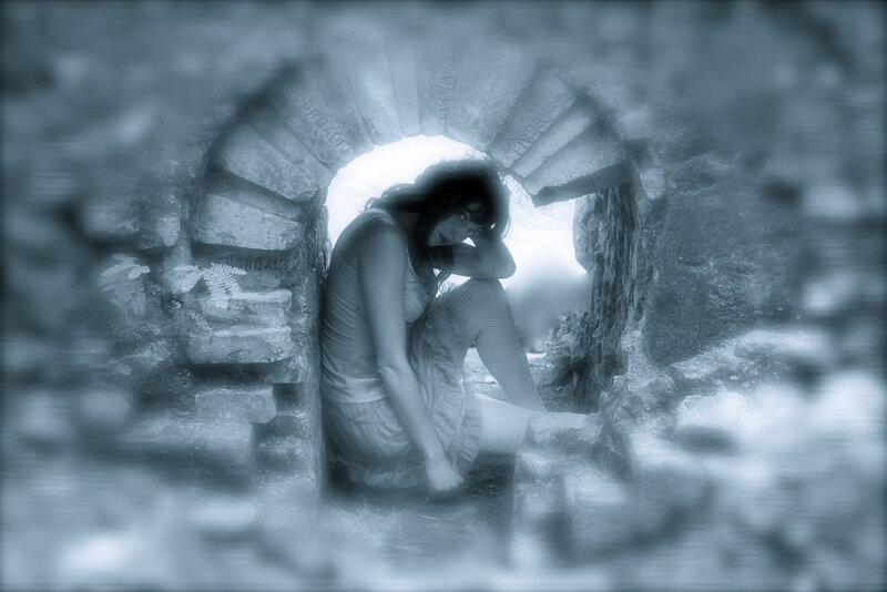 Woman in Stone Archway — Blue
