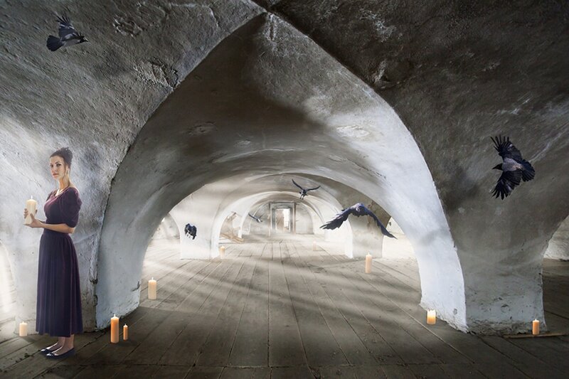 Woman in Stone Corridor — Gray