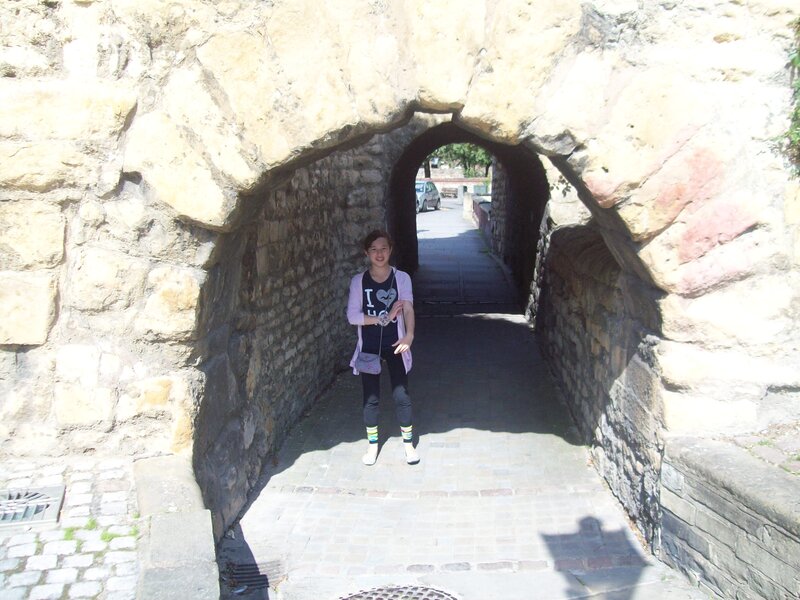 Woman in Stone Tunnel