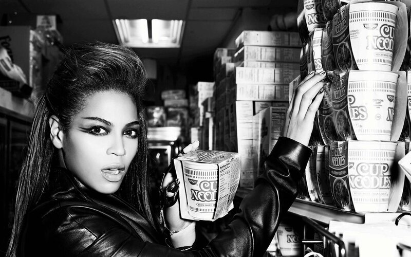 woman in store with cup noodles