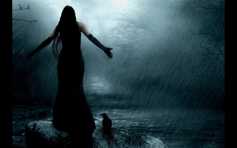 woman in storm on a rock