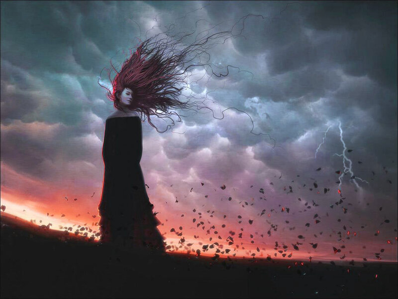 Woman in stormy landscape