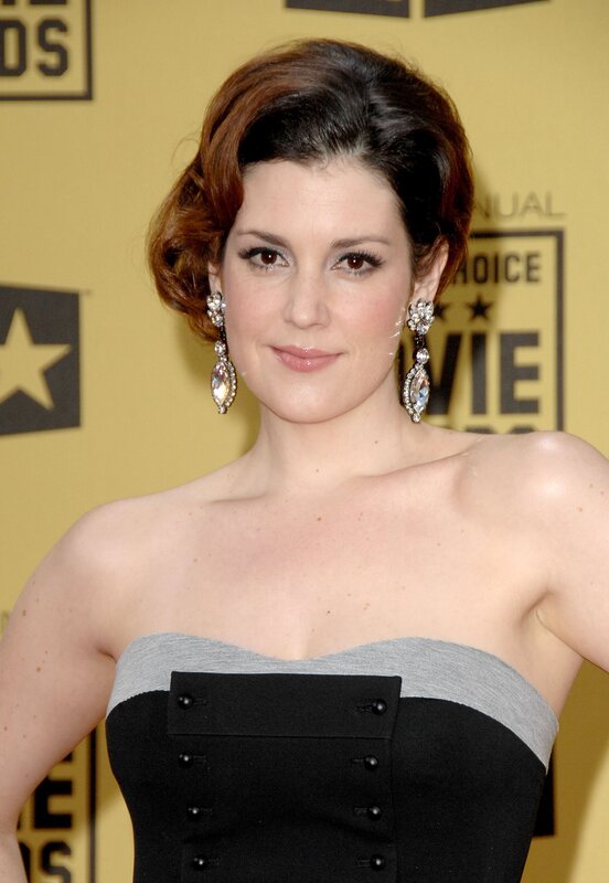woman in strapless dress at event