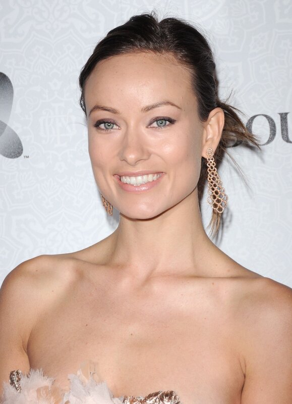woman in strapless dress smiling