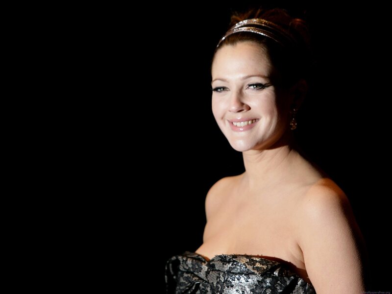 woman in strapless dress smiling