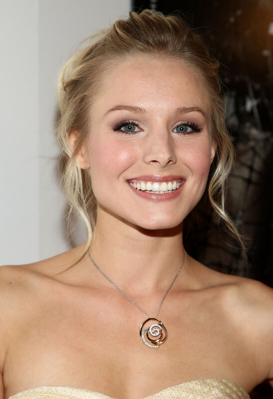 woman in strapless dress smiling