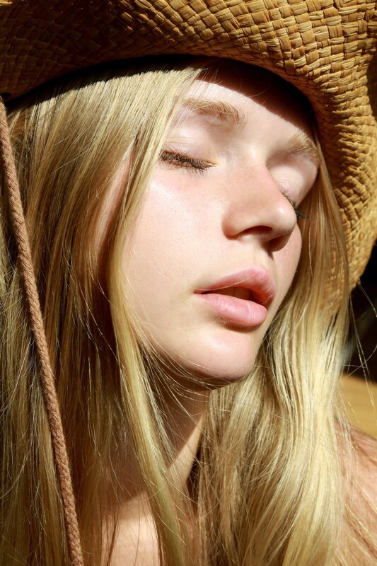 woman in straw hat