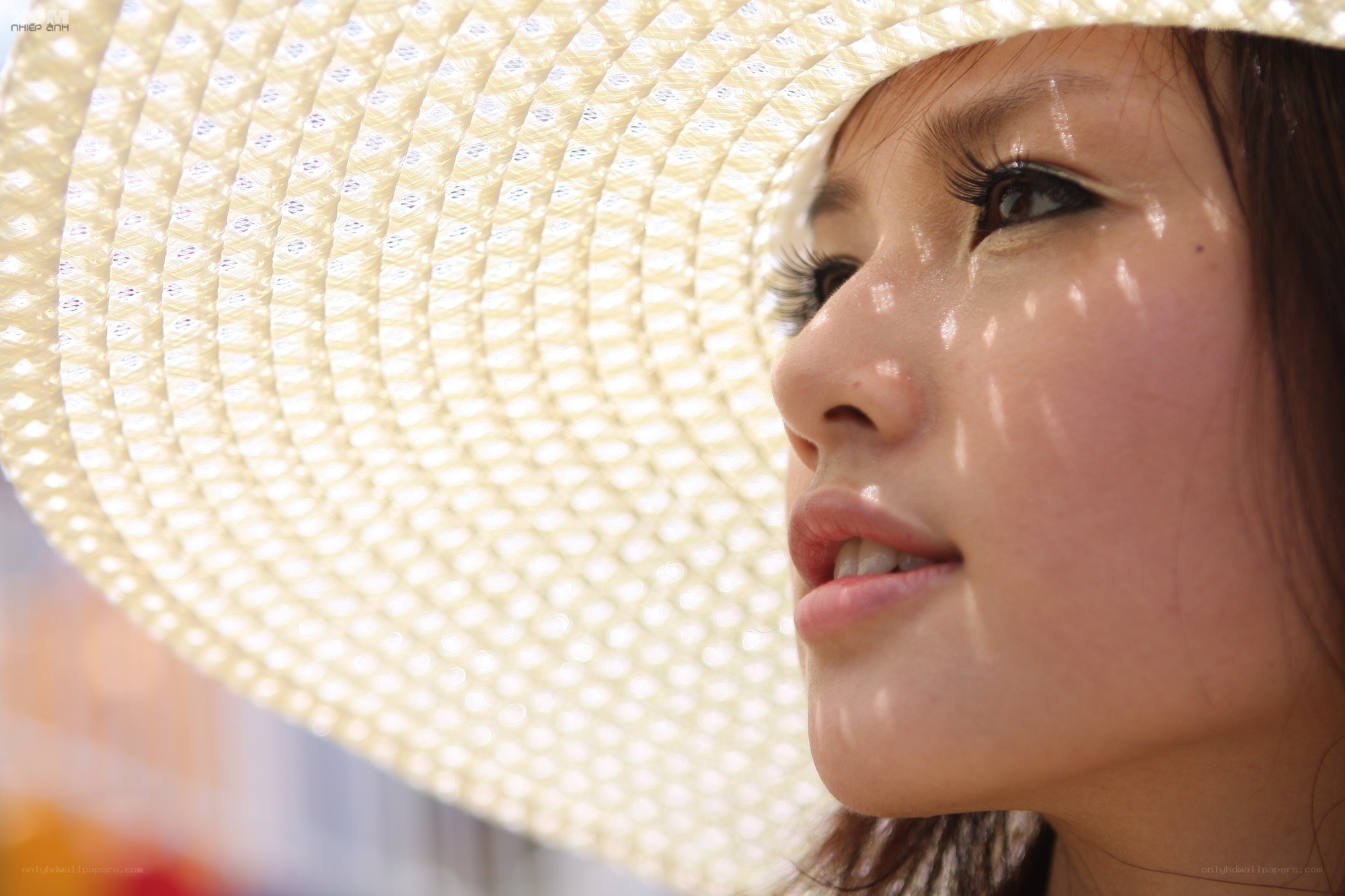 woman in straw hat