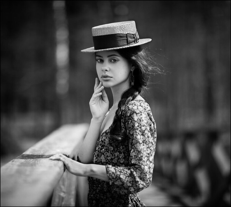 Woman in Straw Hat — Black, Contemplative