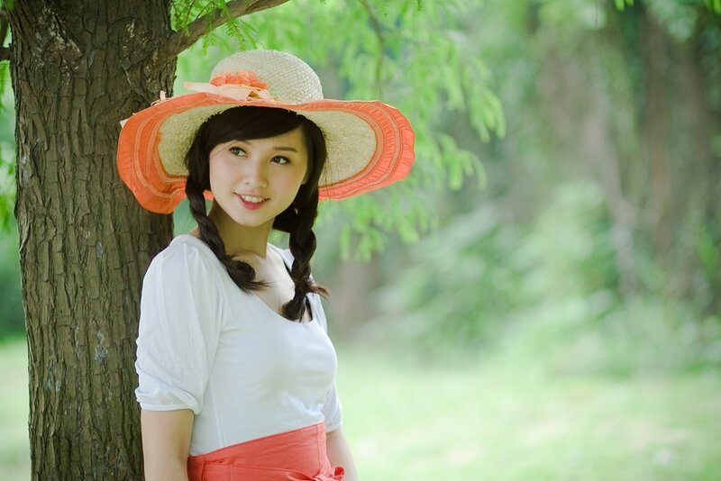 Woman in Straw Hat — Green, Serene, Afternoon, Photograph, Tree, Braids