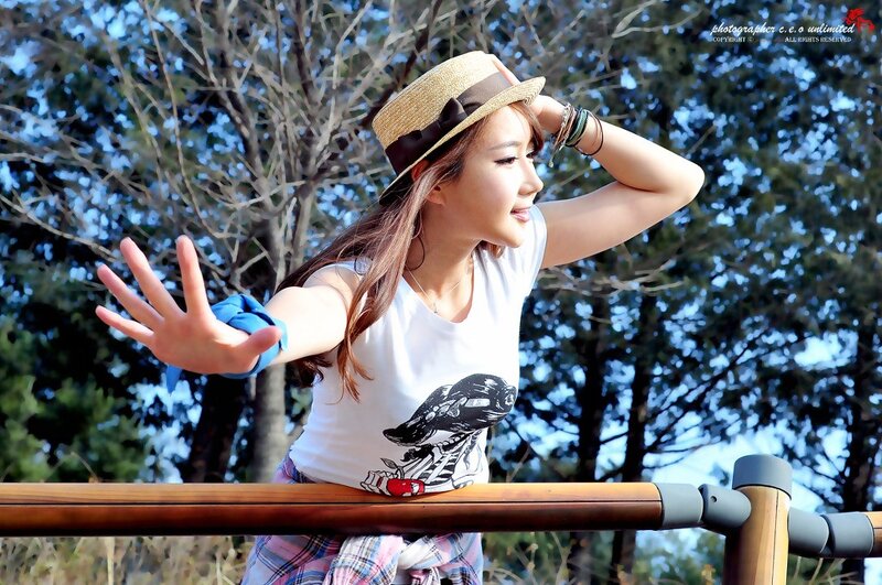 woman in straw hat outdoors